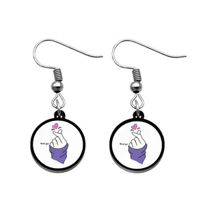 گوشواره زنانه ناکسیگو مدل شب تاب طرح دست و قلب کد ES8136