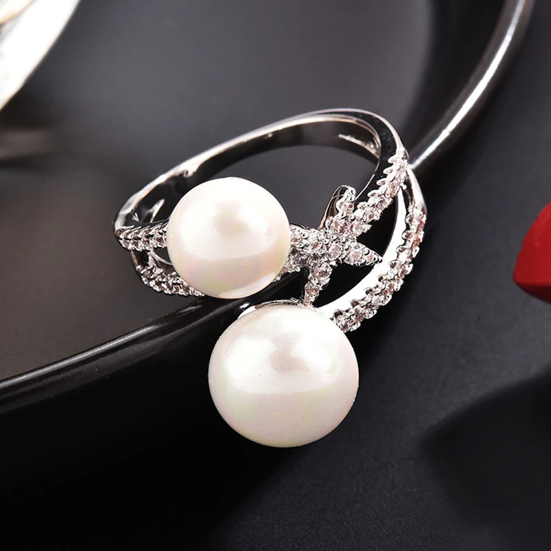 عکس شماره 2 : انگشتر زنانه مدل دو مروارید کد 00683