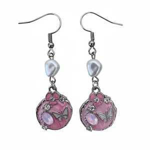 گوشواره دخترانه مدل مدال پینترستی پروانه و مروارید