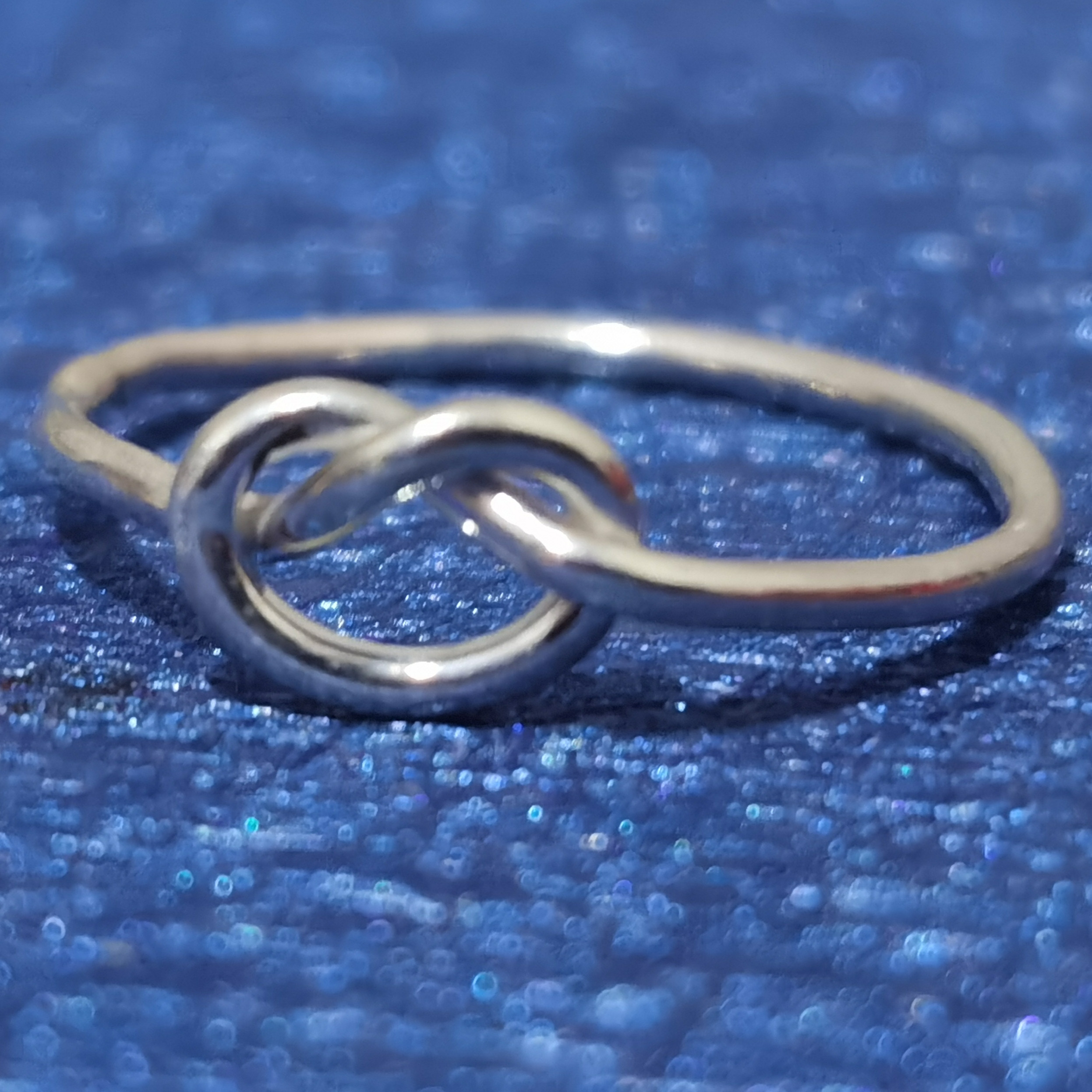 انگشتر نقره زنانه مدل گره H07