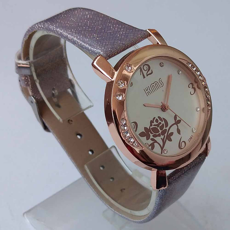 ساعت مچی عقربه ای دخترانه مدل بندچرمی نگین دار کد 50