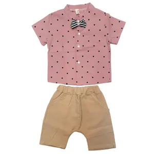 ست پیراهن و شلوارک پسرانه مدل خال خالی رنگ صورتی