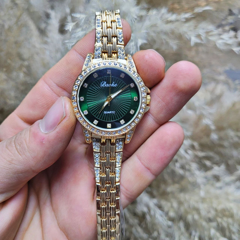 ساعت مچی عقربه ای زنانه مدل دورنگین کد st ساعت مچی عقربه ای زنانه مدل دورنگین کد st