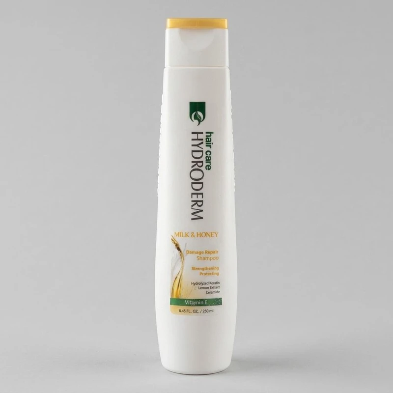 شامپو مو هیدرودرم مدل Milk and Honey حجم 250 میلی‌لیتر، تقویت‌کننده، ترمیم‌کننده، براق کننده، مناسب موهای آسیب دیده، حاوی عصاره شیر و عسل