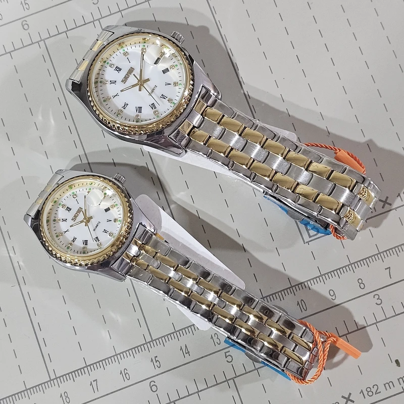 عکس شماره 4 : ست ساعت مچی عقربه-ای کوارتز زنانه و مردانه اسکمی مدل 90-98 کد 05