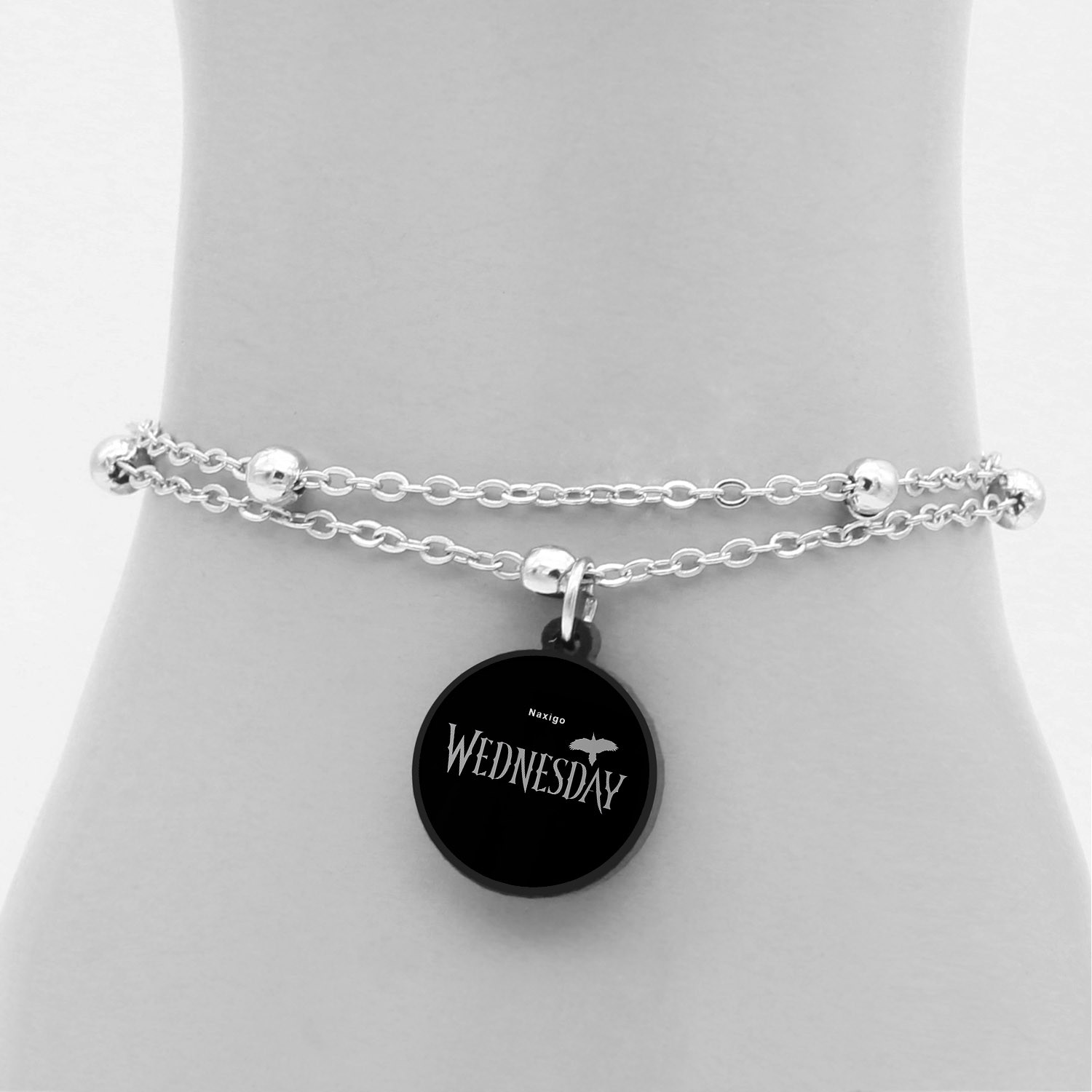 پابند زنانه ناکسیگو مدل شب تاب طرح Wednesday کد LB7389 پابند زنانه ناکسیگو مدل شب تاب طرح Wednesday کد LB7389