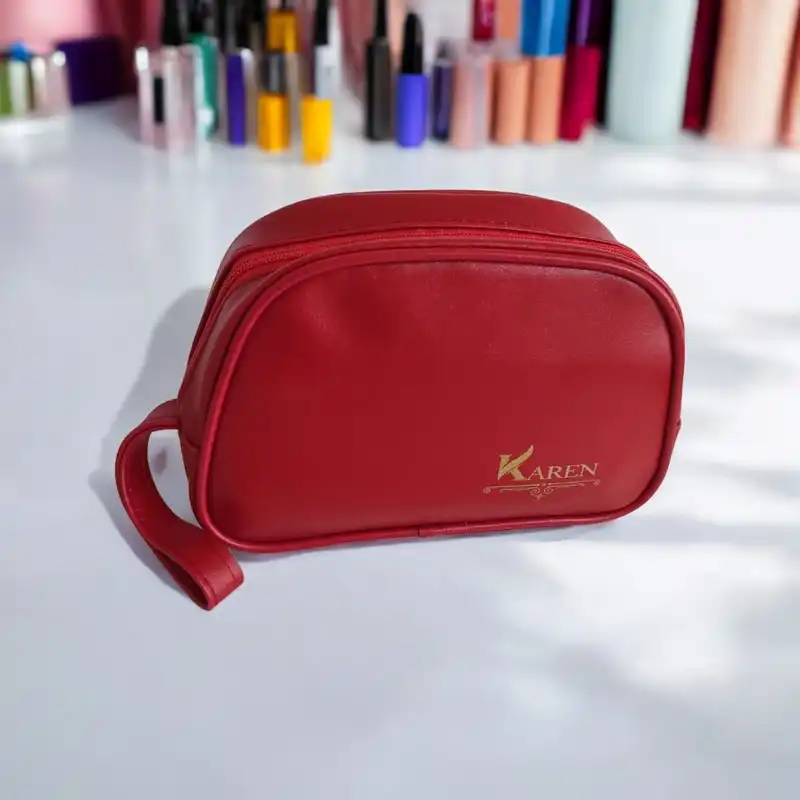 کیف لوازم آرایش زنانه مدل چرمی نیمگرد تبله دار