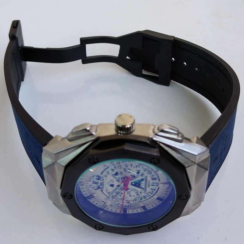 ساعت مچی عقربه ای پسرانه مدل تراش خورده کد 458