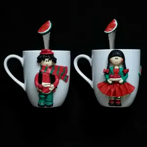 ماگ سرامیکی مدل شب یلدا کد L650 به همراه قاشق مجموعه 2 عددی