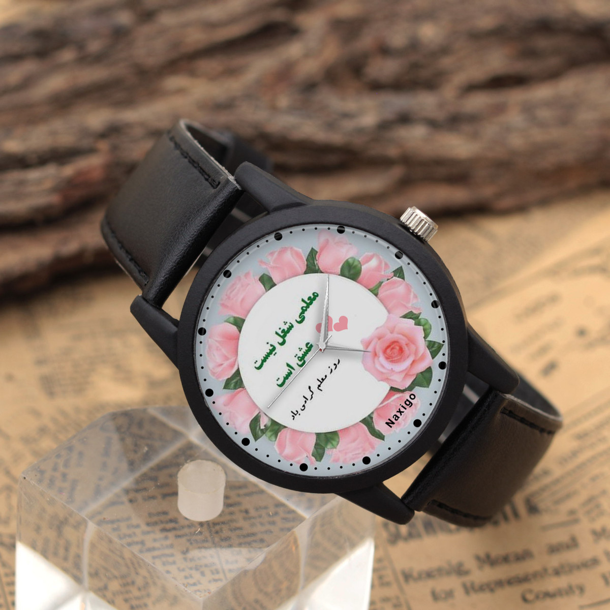 ساعت مچی عقربه ای ناکسیگو مدل روز معلم کد LF12349 ساعت مچی عقربه ای ناکسیگو مدل روز معلم کد LF12349