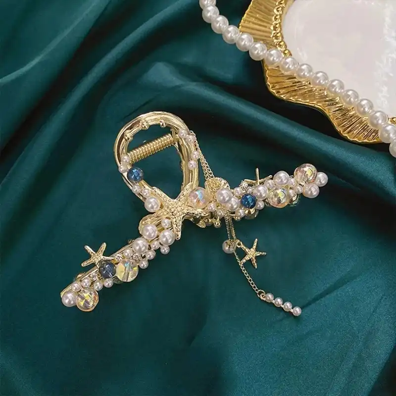 کلیپس مو زنانه مدل فلزی صدف آویزدار