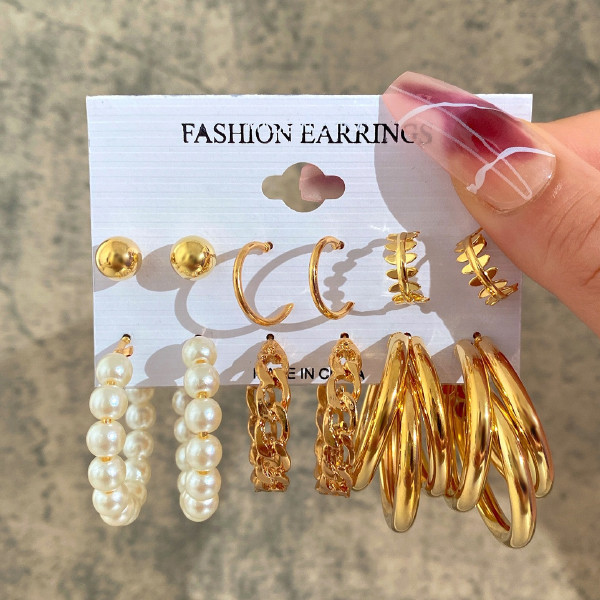 گوشواره زنانه مدل حلقه ای طنابی بسته 12 عددی گوشواره زنانه مدل حلقه ای طنابی بسته 12 عددی