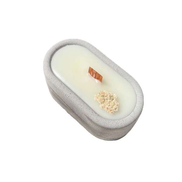 شمع دست ساز مدل بتنی بیضی با گل