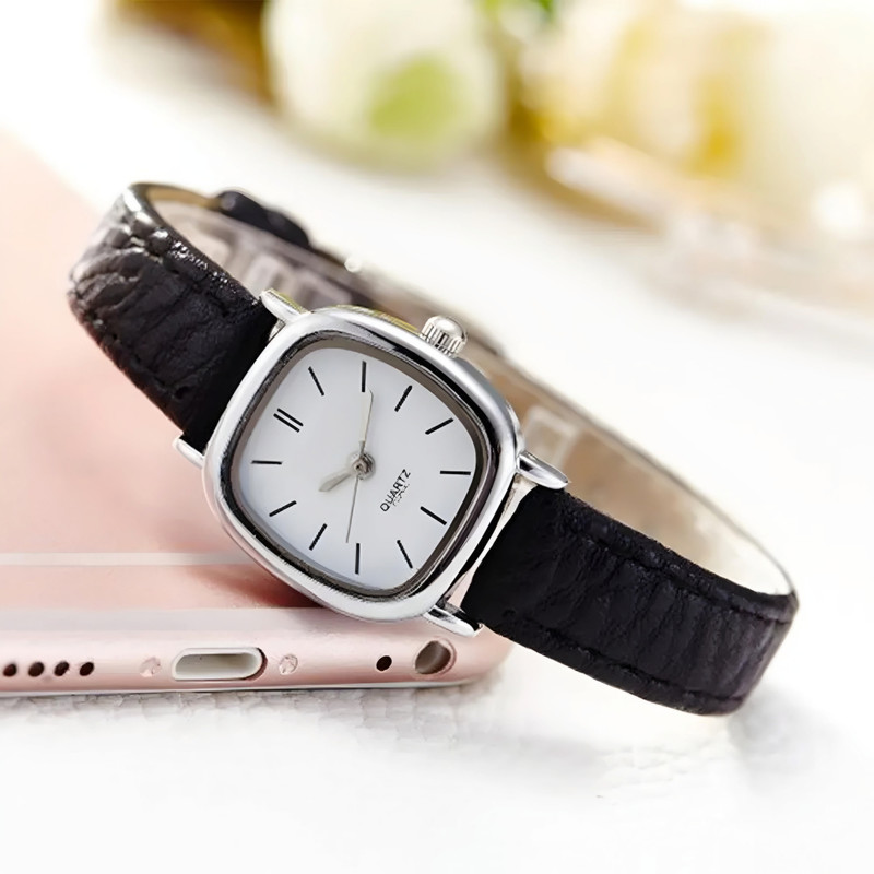 ساعت مچی عقربه ای زنانه مدل کلاسیک بند چرم کد 2 ساعت مچی عقربه ای زنانه مدل کلاسیک بند چرم کد 2