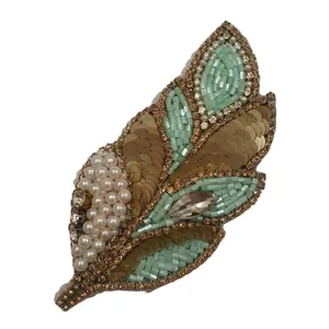 گل سینه زنانه مدل گندم