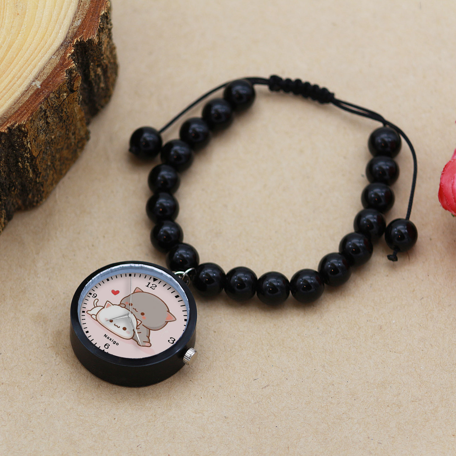 ساعت مچی عقربه ای ناکسیگو مدل گربه ملوس کد BF12537 ساعت مچی عقربه ای ناکسیگو مدل گربه ملوس کد BF12537