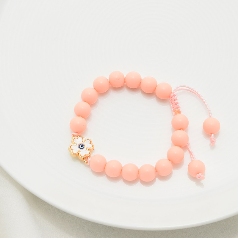 دستبند دخترانه دلنار گالری مدل شبدر صدفی و چشم نظر