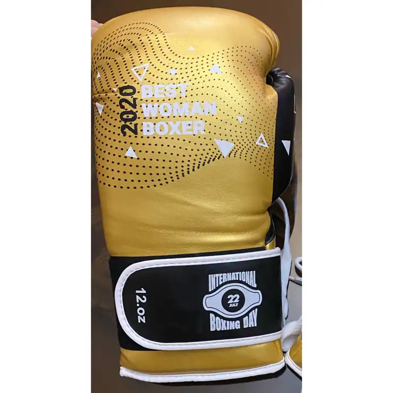 دستکش بوکس مدل چرم طبیعی بندی چسبی