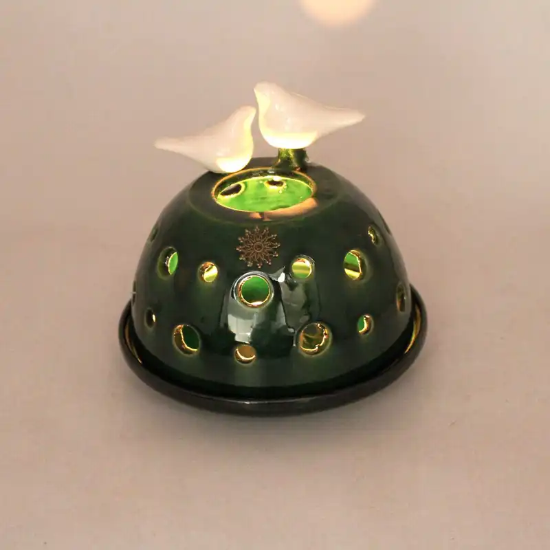 شمعدان سفالی طرح پرنده