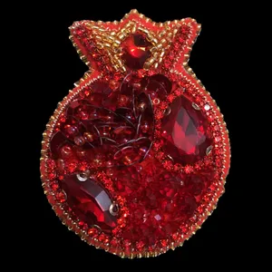 گل سینه زنانه طرح انار