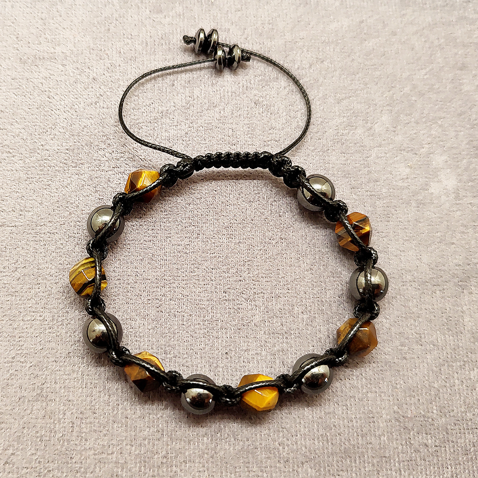 دستبند زنانه مدل بافت سنگ چشم ببر و حدید دستبند زنانه مدل بافت سنگ چشم ببر و حدید