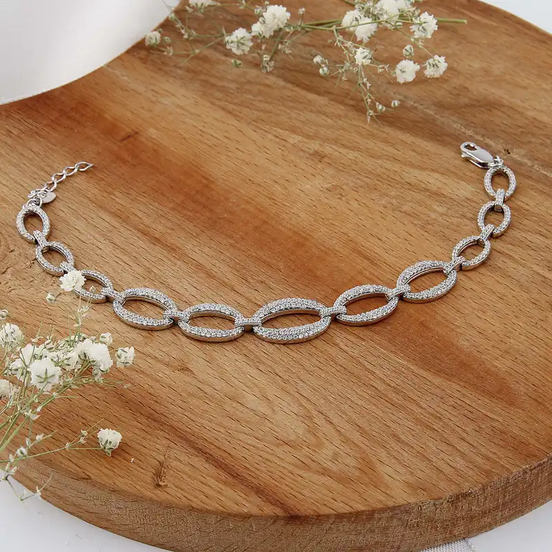 دستبند نقره زنانه بازرگانی میلادی مدل فول نگین برلیان بدون ریزش آبکاری رادیوم قالب جواهری کد DP_781