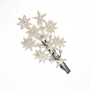 گیره مو زنانه مدل انبری طرح ستاره نگین دار 