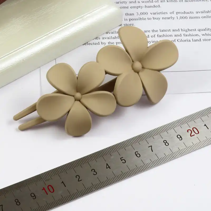 کلیپس مو زنانه مدل منقاری گل بابونه کد G_Lnd_1466