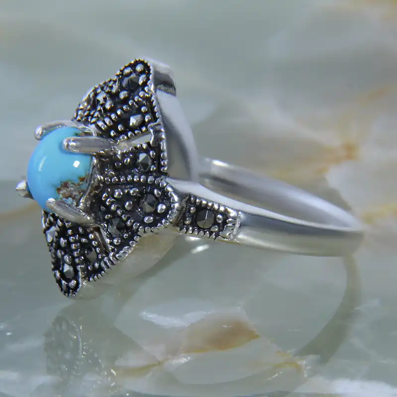 انگشتر نقره زنانه بازرگانی میلادی مدل سنگ فیروزه طبیعی نیشابور نیگن مارکازیت سیاه قلم کد AW_206