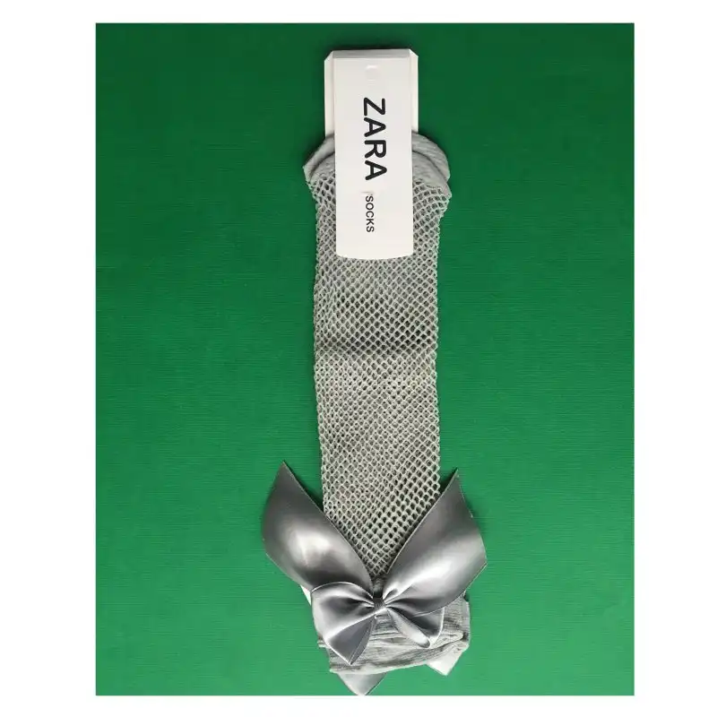 جوراب ساق بلند دخترانه مدل زنبوری پاپیون دار