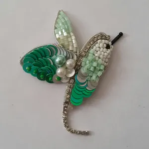 گل سینه زنانه مدل پرنده