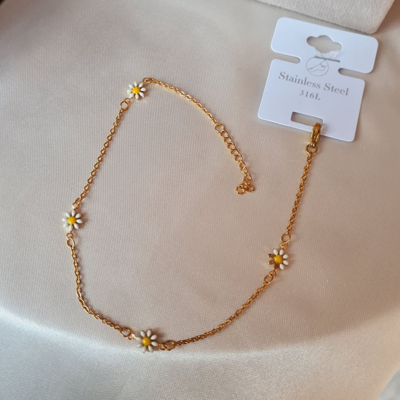 پابند زنانه استینلس استیل مدل بابونه تک لاین