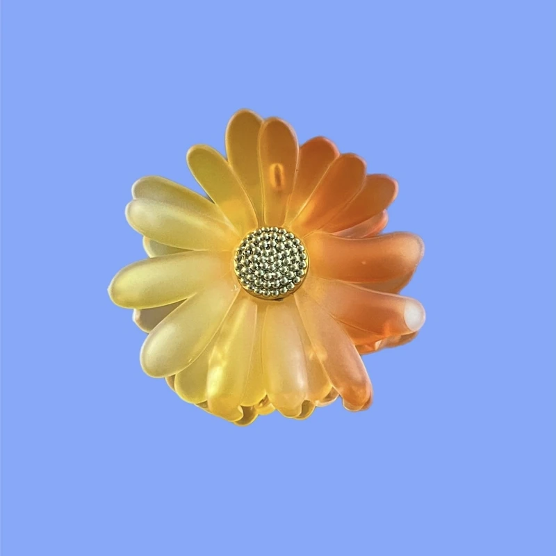 کلیپس مو زنانه مدل گل بابونه شمعی براق کد A2