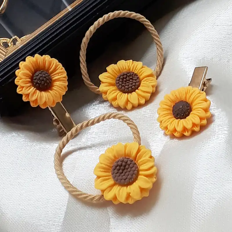 ست کش و گیره مو زنانه مدل آفتابگردان بسته 4 عددی