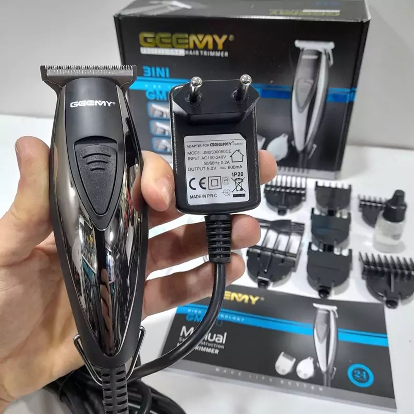 ماشین اصلاح موی سر و صورت و بدن جیمی مدل GM-830، اصلاح به صورت خط زن، قابلیت تنظیم سرعت، منبع انرژی با آداپتور برق، تکنولوژی اصلاح به صورت برش مستقیم، اندازه اصلاح 0.2 میلی‌متر، به‌همراه برس تمیزکننده -  - 9