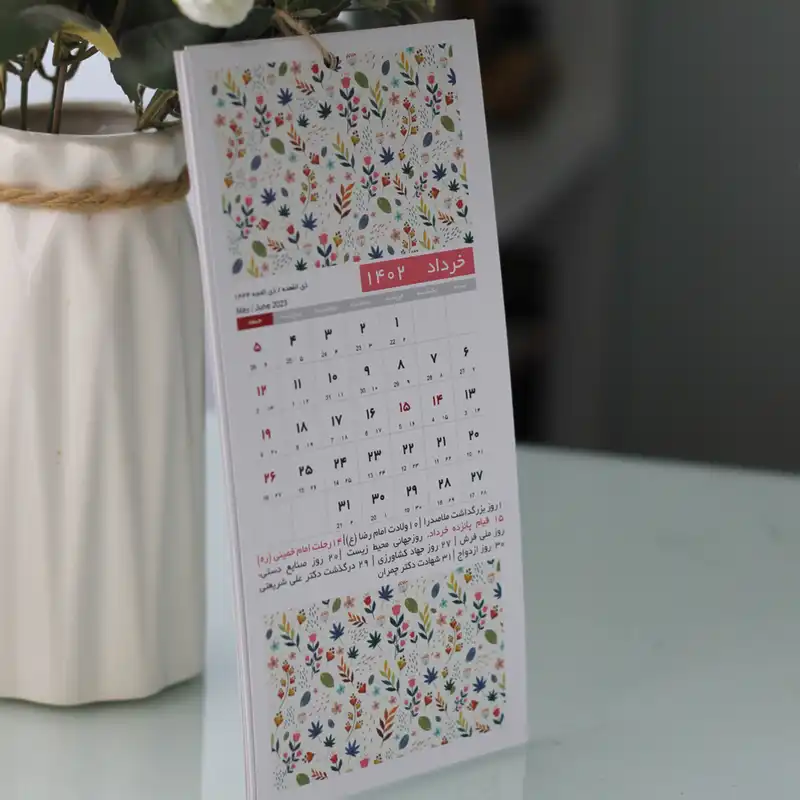 تقویم دیواری سال 1402 طرح گل های باغ