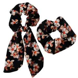 کش مو زنانه دلنار گالری مدل اسکرانچی شکوفه مجموعه 2 عددی