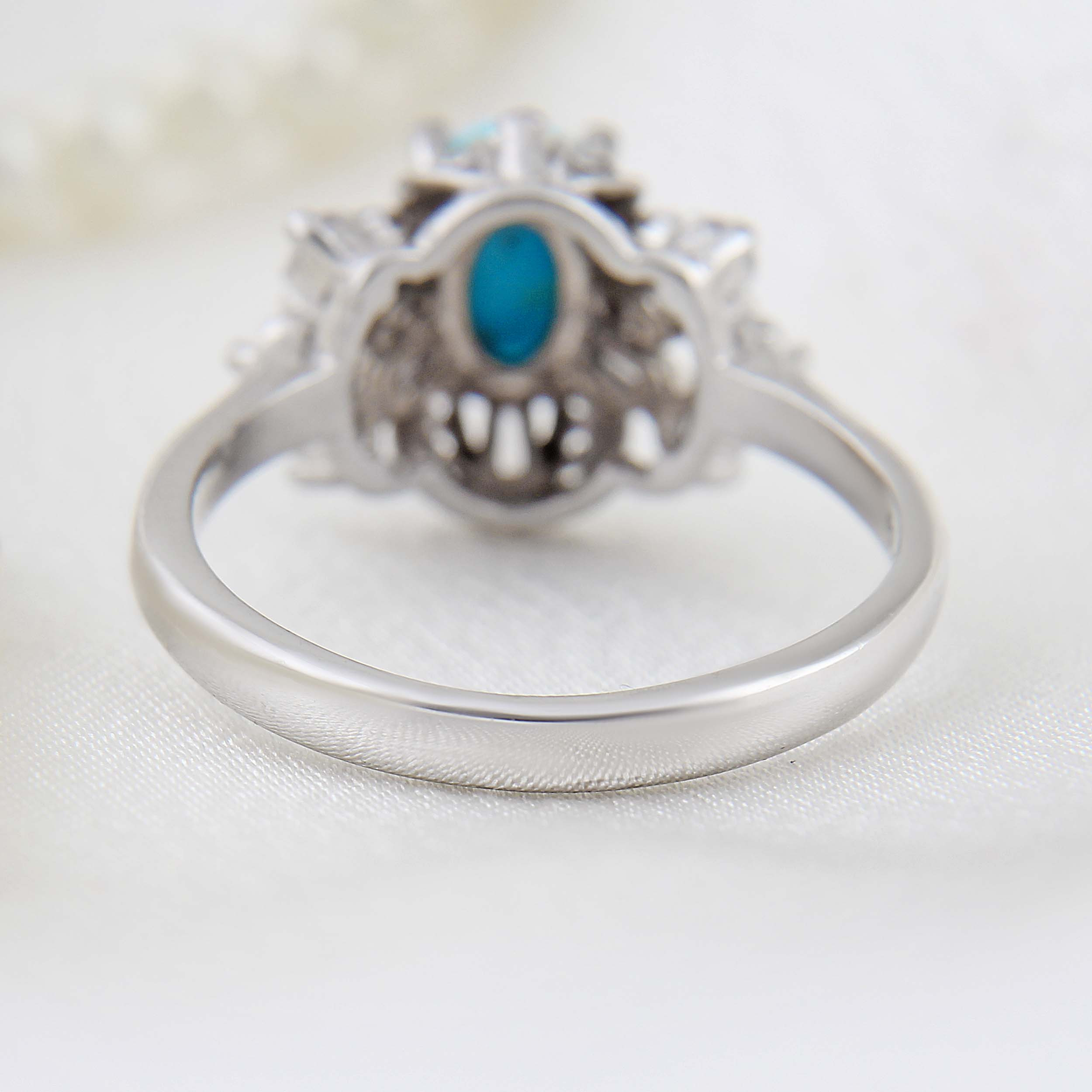 انگشتر نقره زنانه بازرگانی میلادی مدل فیروزه طبیعی نیشابور قالب جواهری ر وکش رادیوم کد AWR-1640