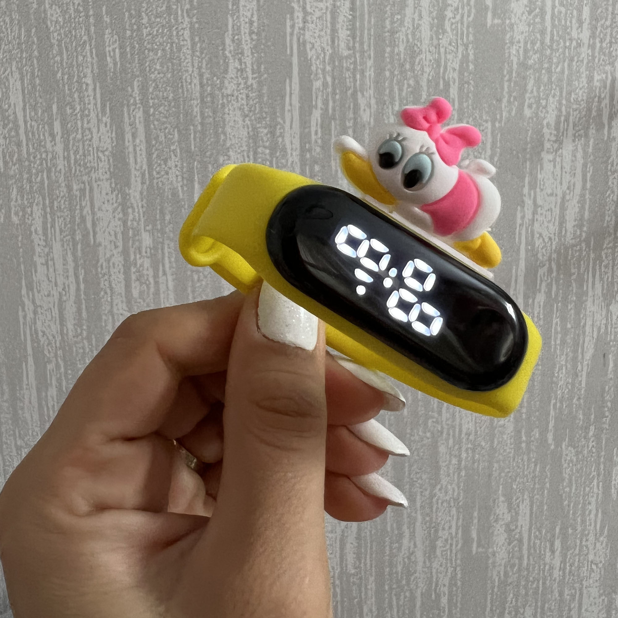 ساعت مچی دیجیتال بچگانه مدل ضد آب لمسی طرح بیبی داکی کد BB YEL 22 ساعت مچی دیجیتال بچگانه مدل ضد آب لمسی طرح بیبی داکی کد BB YEL 22