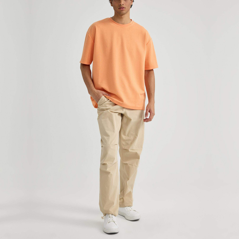 شلوار آزاد مردانه دفکتو مدل 053BG732 رنگ بژ