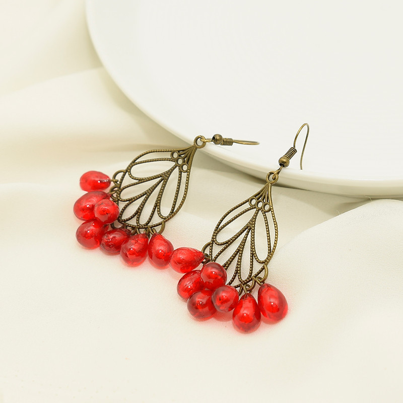 گوشواره زنانه دلنار گالری مدل کشکول دانه انار 2 گوشواره زنانه دلنار گالری مدل کشکول دانه انار 2