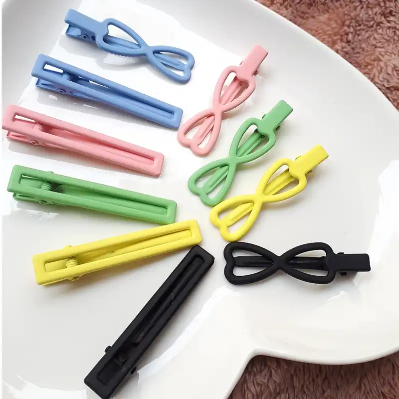 گیره مو زنانه مدل پاپیون و مستطیل انبری مات پاستیلی بسته 2 عددی