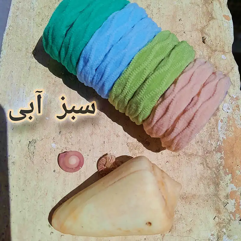 کش مو زنانه مدل حوله ای طرح مارپیچ پاستلی کد ngr332