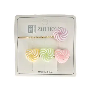 سنجاق مو دخترانه مدل 0006 طرح آبنبات بسته 2 عددی