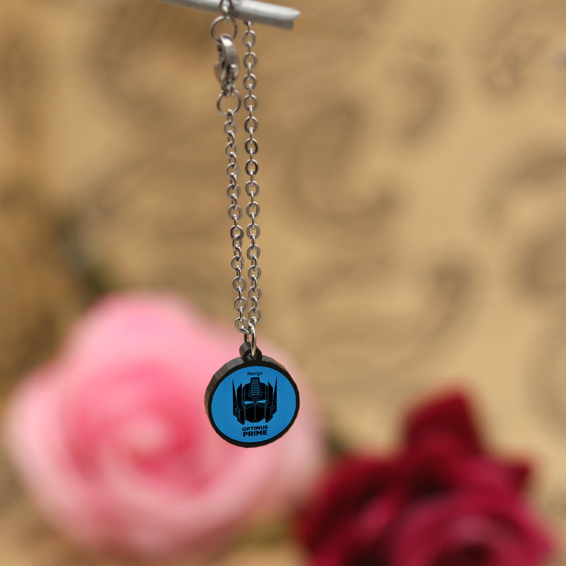 آویز ساعت زنانه ناکسیگو مدل شب تاب طرح اپتیموس پرایم کد AW8894