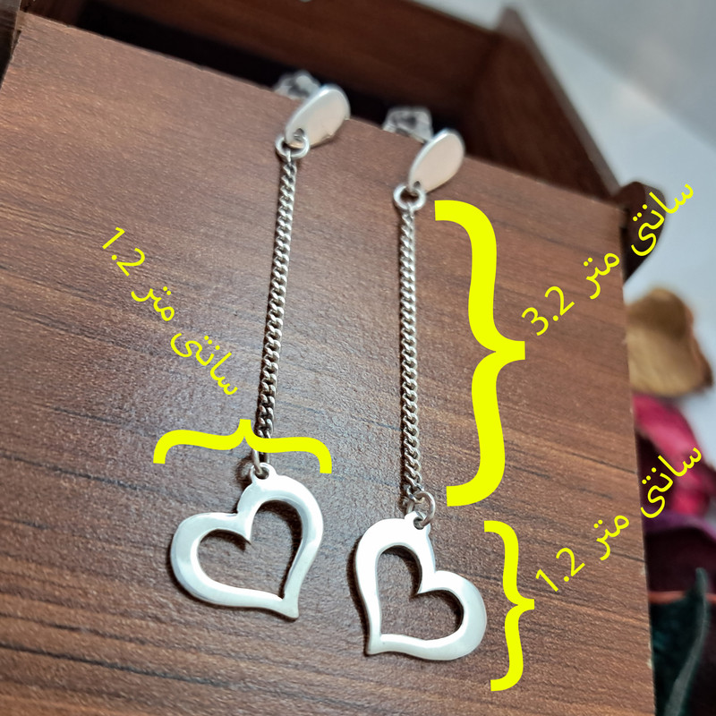 گوشواره نقره زنانه مدل قلب تکی با زنجیر گوشواره نقره زنانه مدل قلب تکی با زنجیر