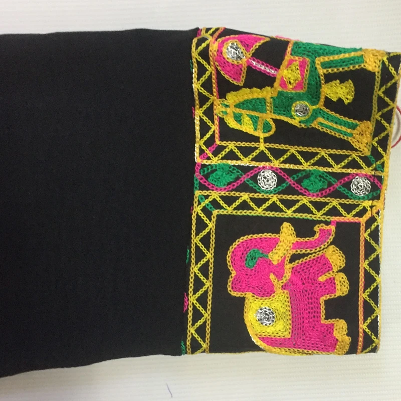 عکس شماره 9 : مانتو و شلوار زنانه مدل نخی ابر و بادی خامه دوزی کد tm-2715