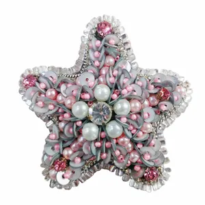 گل سینه زنانه طرح ستاره کد 01