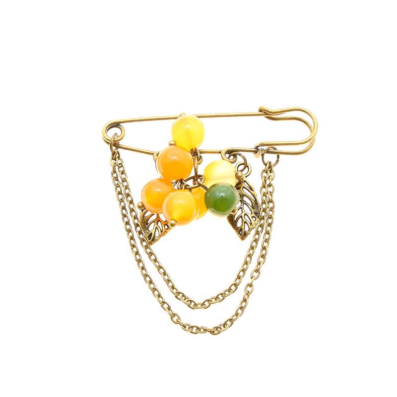 سنجاق سینه زنانه دلنار گالری مدل برگ پاییزی و سنگ عقیق سنجاق سینه زنانه دلنار گالری مدل برگ پاییزی و سنگ عقیق