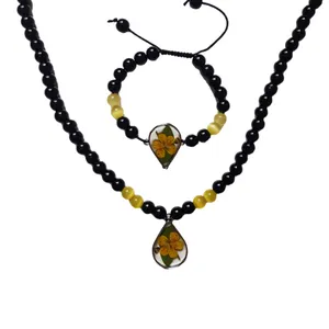 نیم ست زنانه مدل رزینی گل خشک